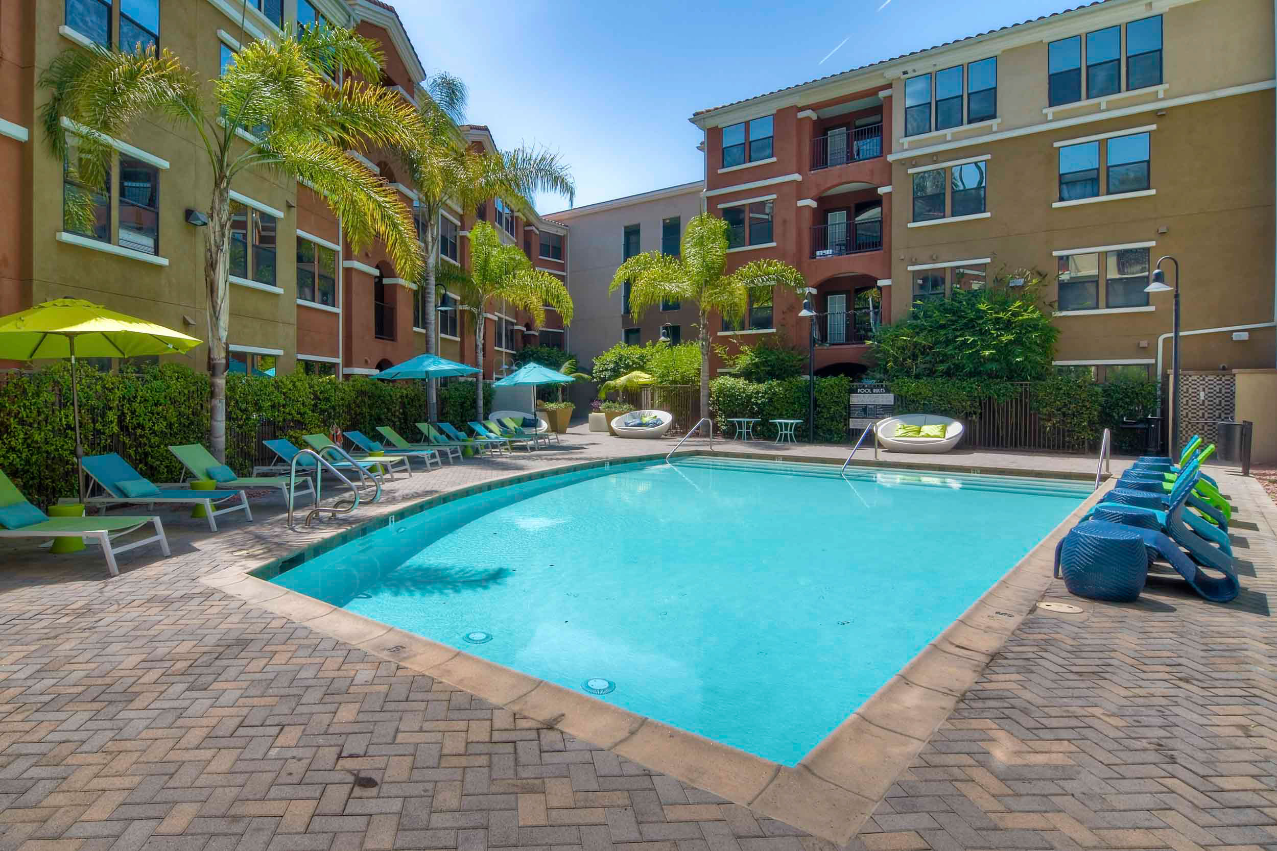 Resort style pool in front of apartment buildings