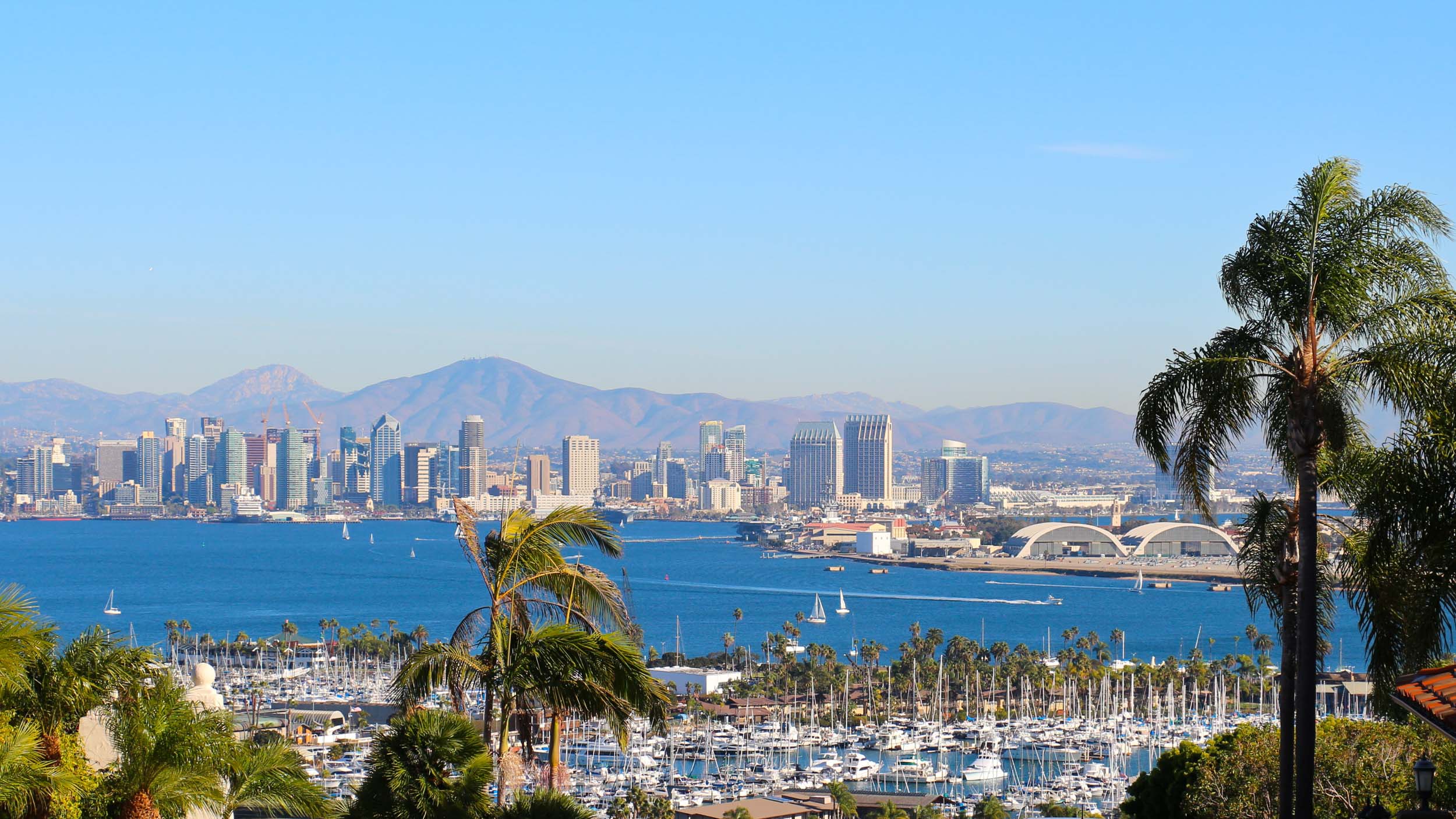 Skyline view of San Diego CA with ocean and mountains