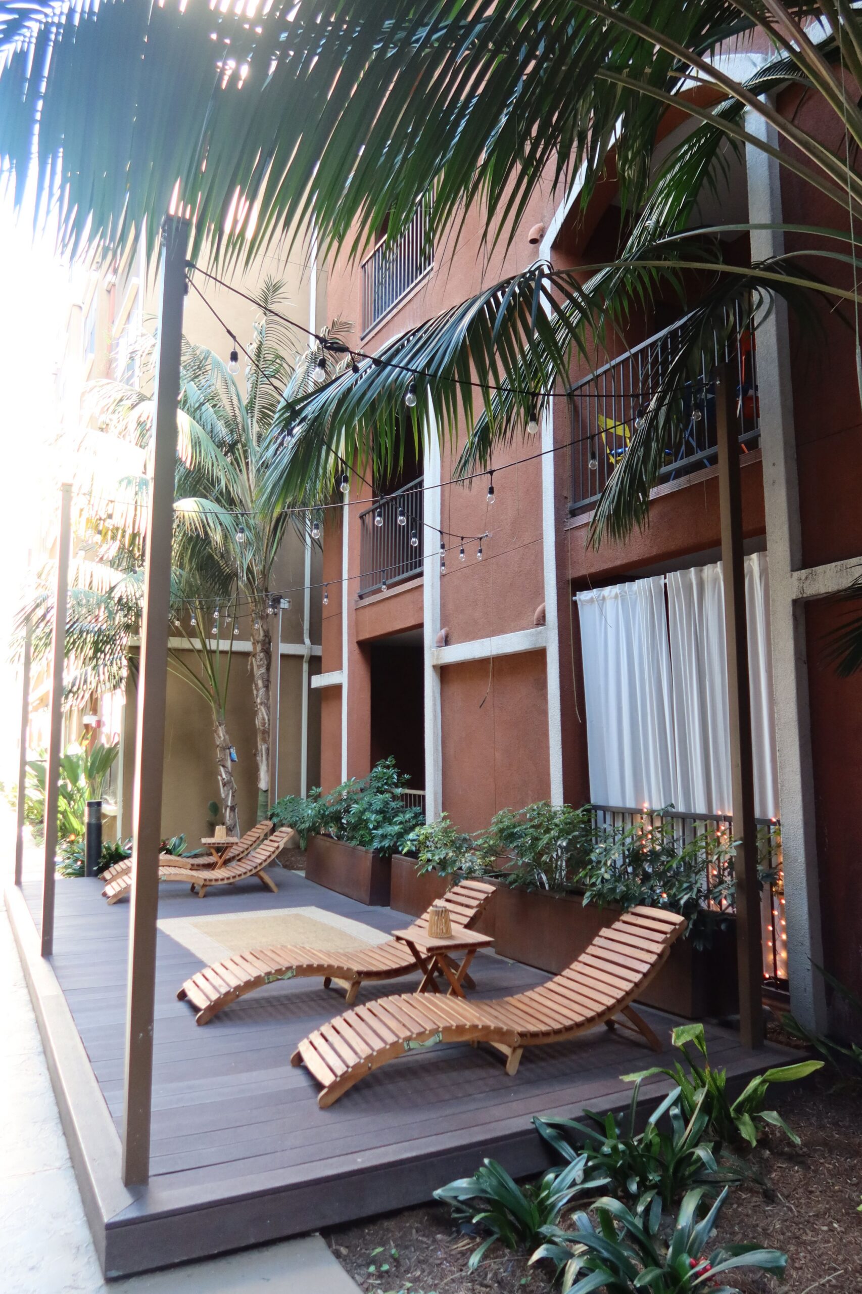resident outdoor courtyard relaxation deck scaled